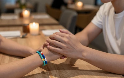 Couple holding hands on a date representing neurodivergent love and relationships
