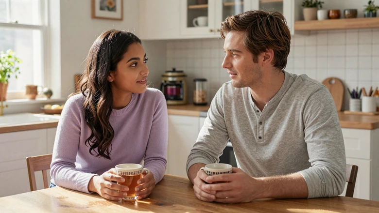 Couple having a calm, supportive conversation at a kitchen table - communication in bipolar relationships